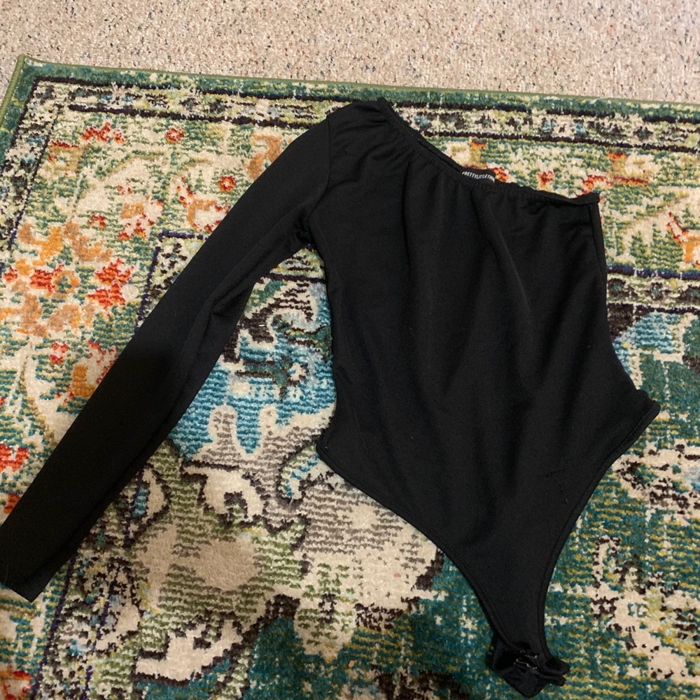 One sleeved one piece